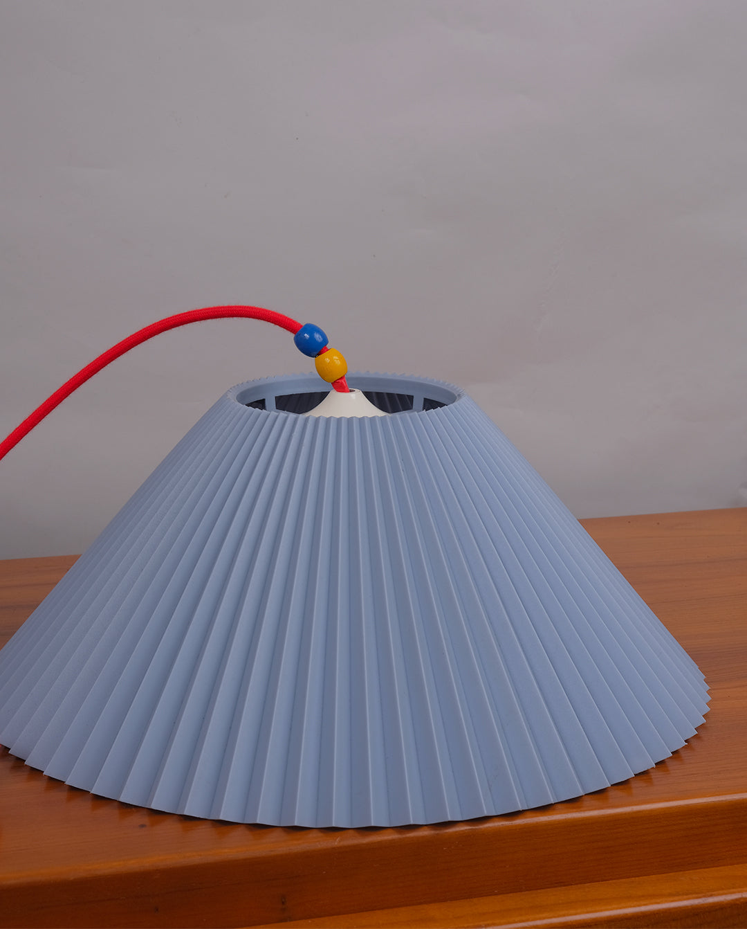 Suspension plastique plissé