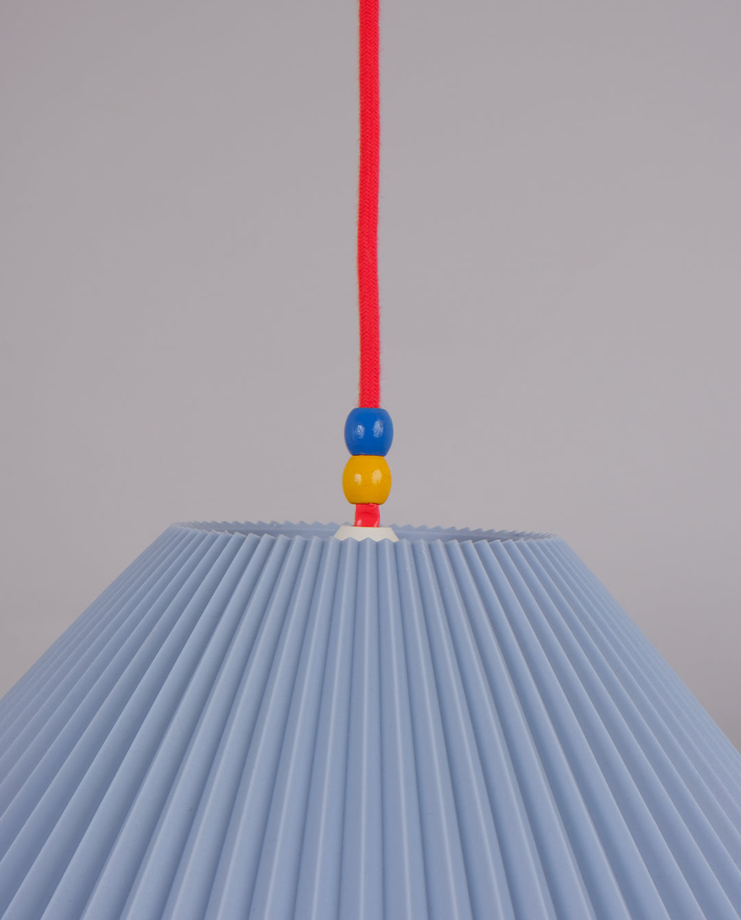 Suspension plastique plissé
