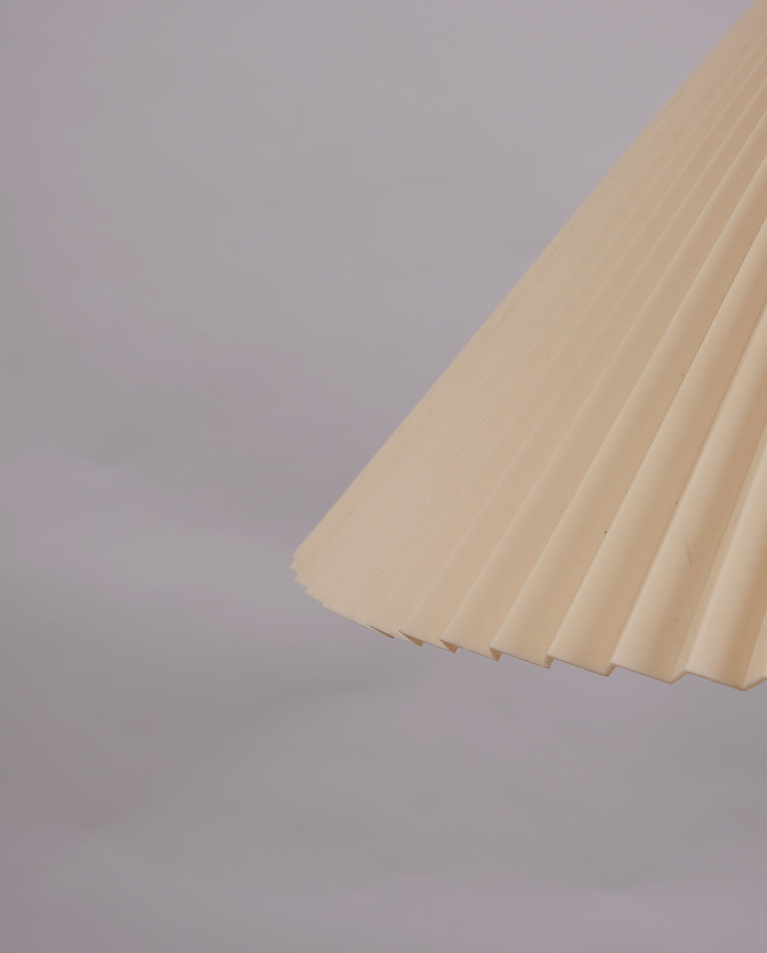 Suspension plastique plissé