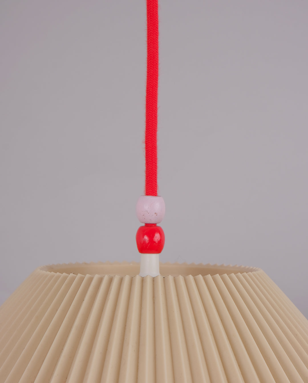 Suspension plastique plissé