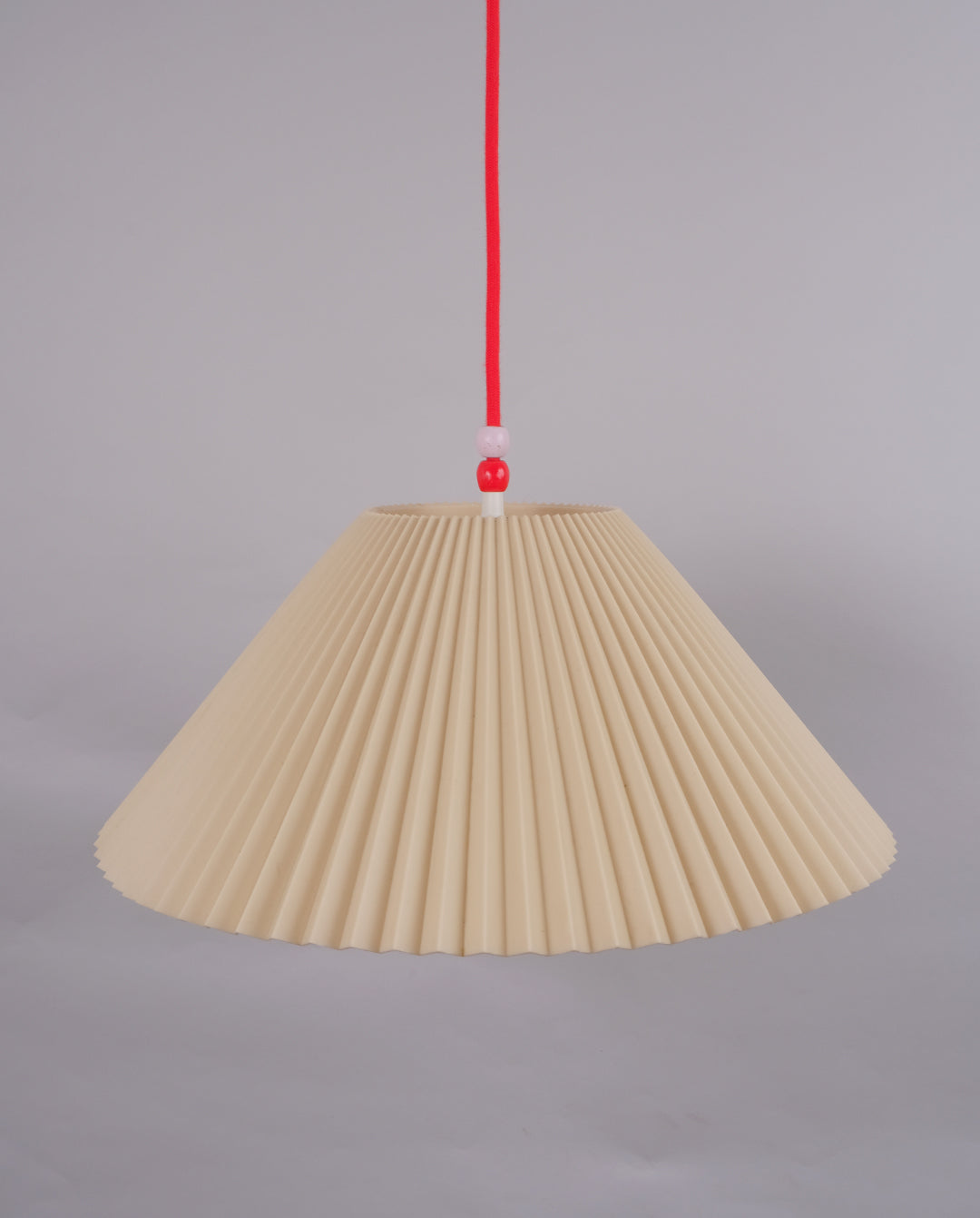 Suspension plastique plissé