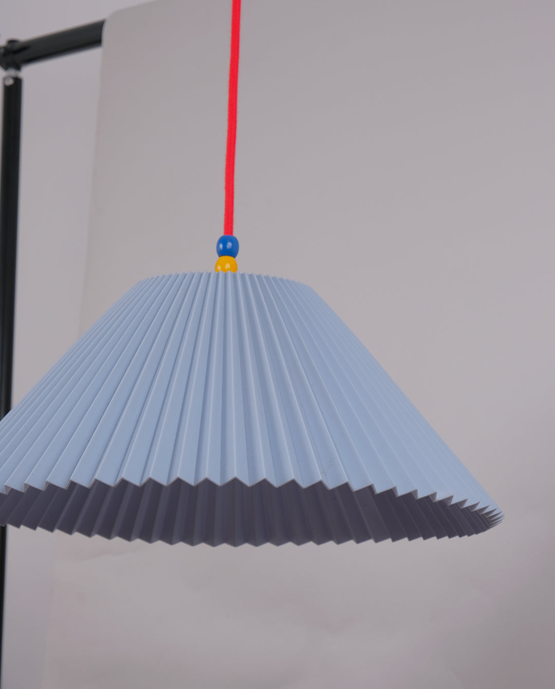 Suspension plastique plissé