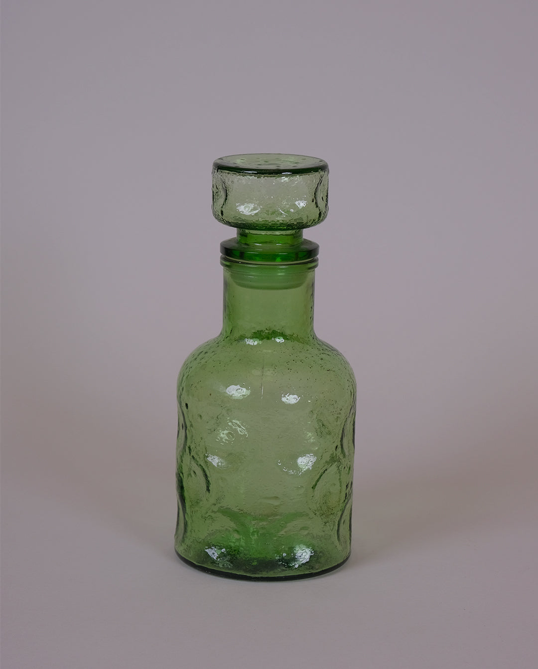 Bouteille en verre teinté années 70