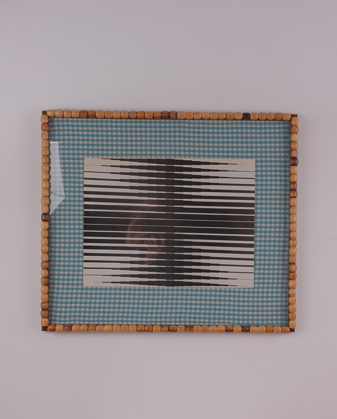 Cadre en perles de bois