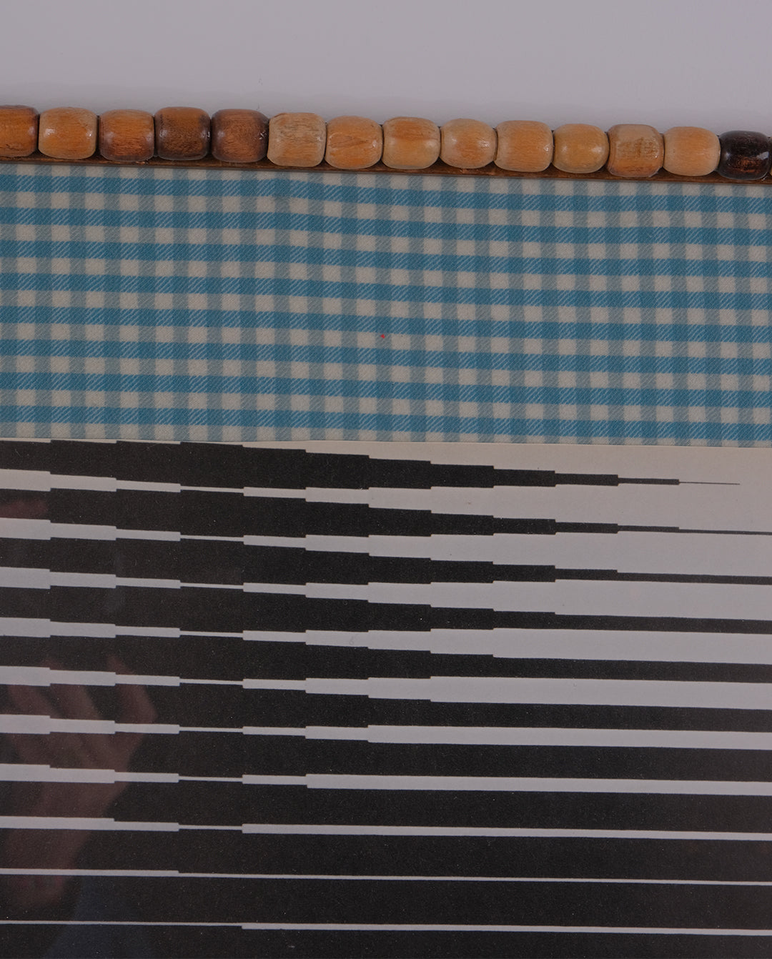 Cadre en perles de bois