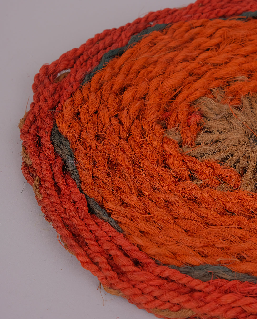 Dessous de plat tressé en fibres naturelles