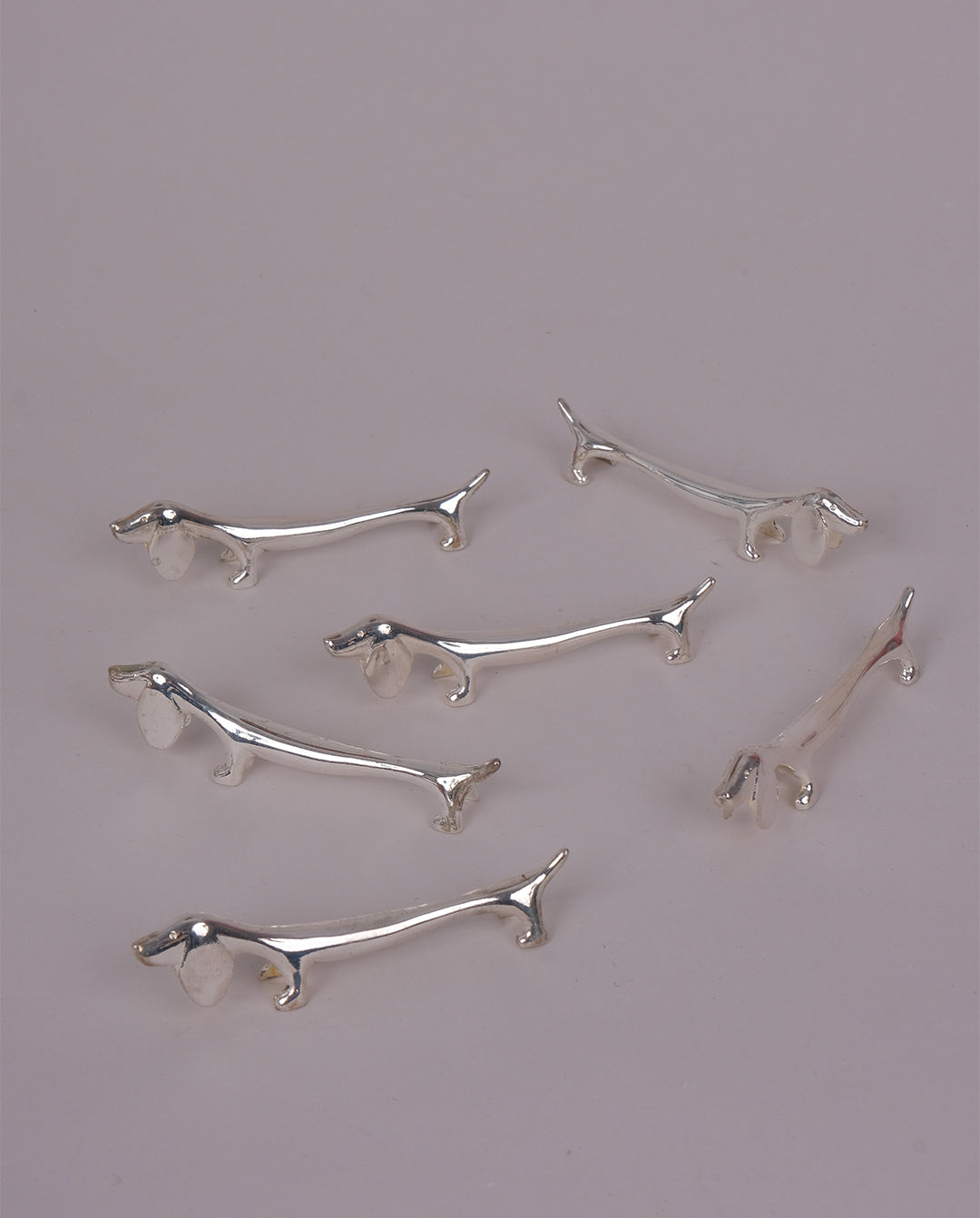 Porte-couteaux en métal argenté x8