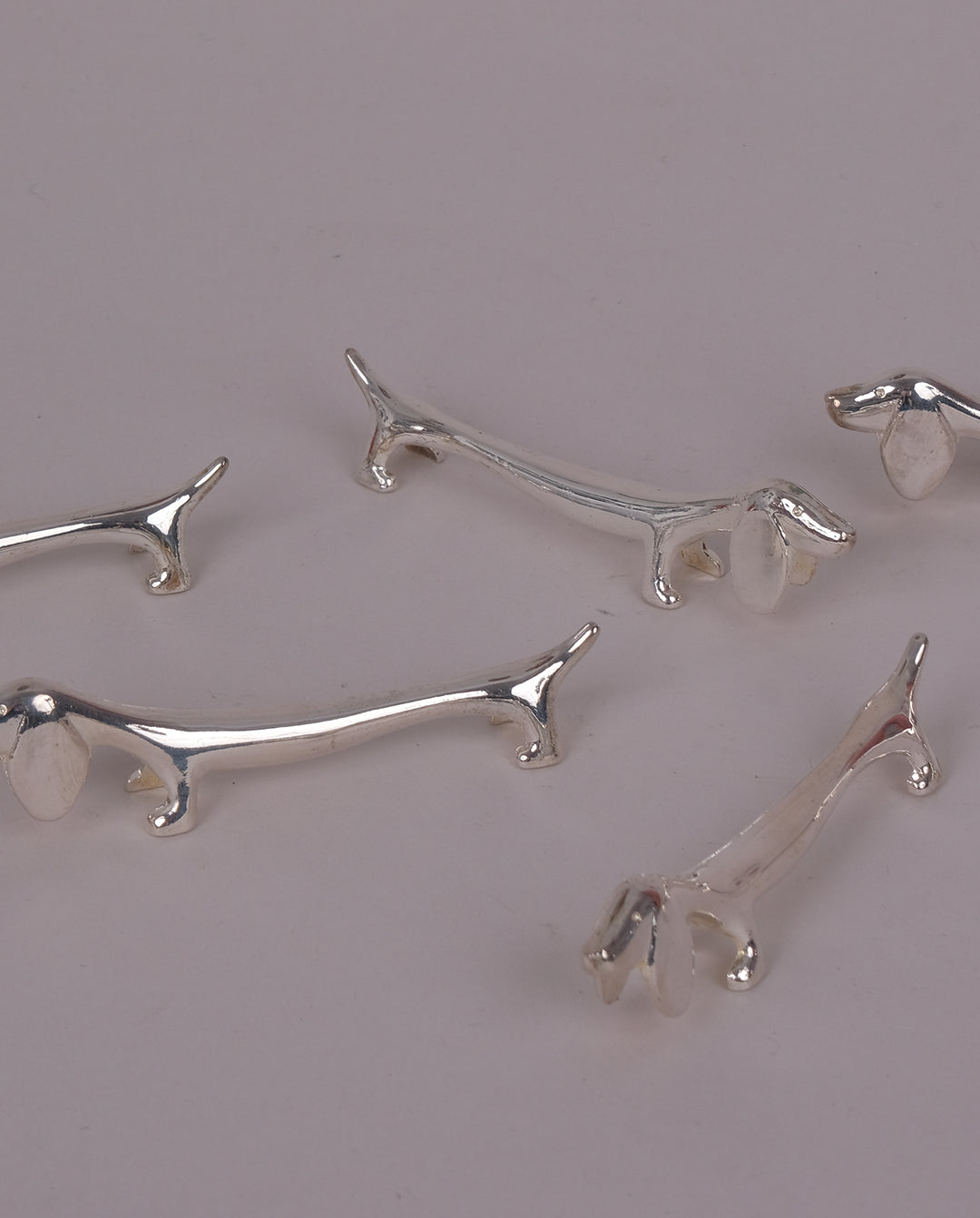 Porte-couteaux en métal argenté x8