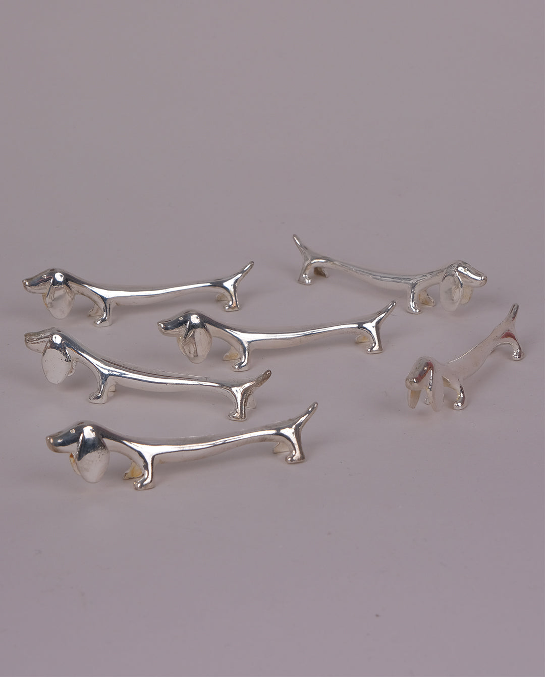 Porte-couteaux en métal argenté x8