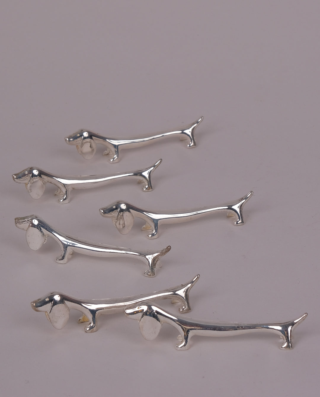 Porte-couteaux en métal argenté x8