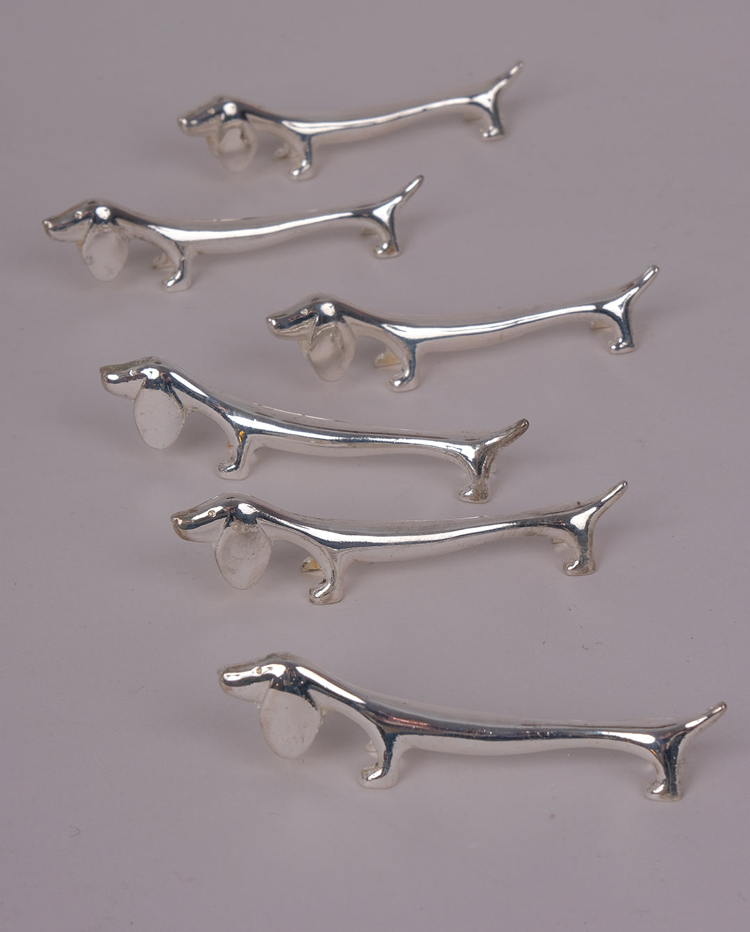 Porte-couteaux en métal argenté x8